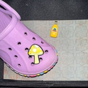 JIBBITZ. CROC CHARMS. Two food items. YUM. Baby Croc not included.